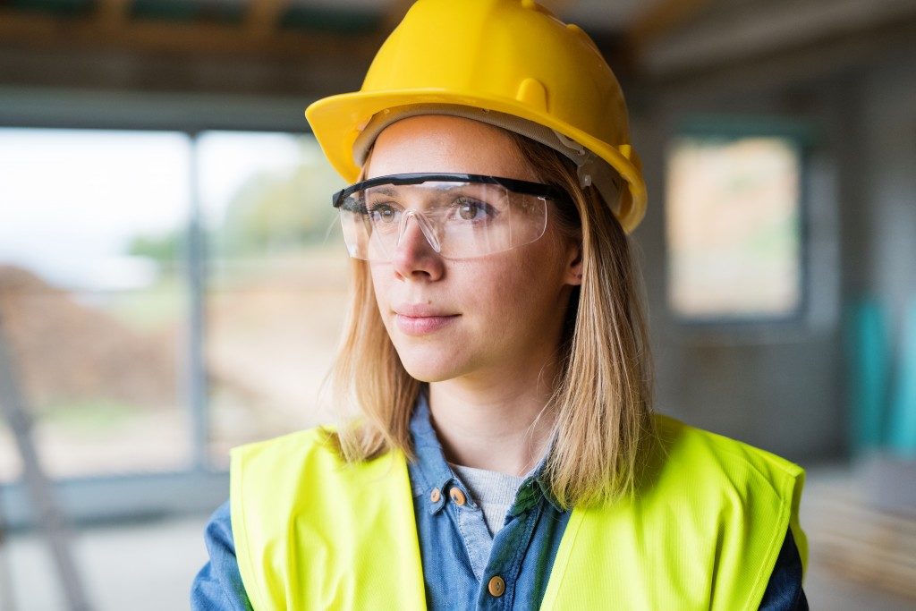 woman wearing safety glasses