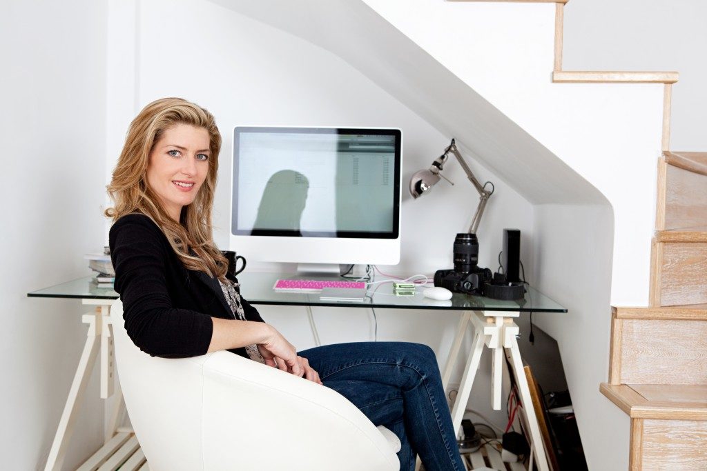 woman sitting at her home office