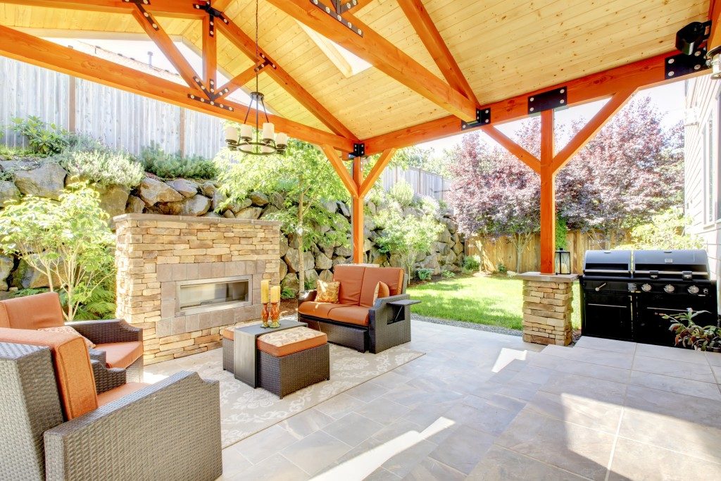 nicely decorated patio with furniture