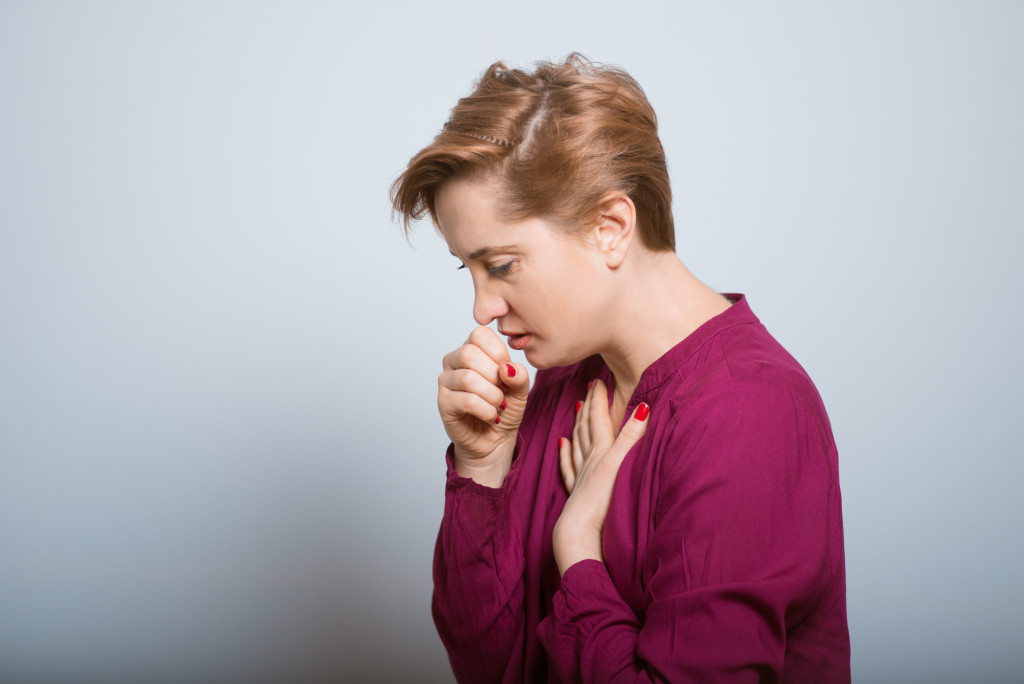 Woman sick with bronchitis
