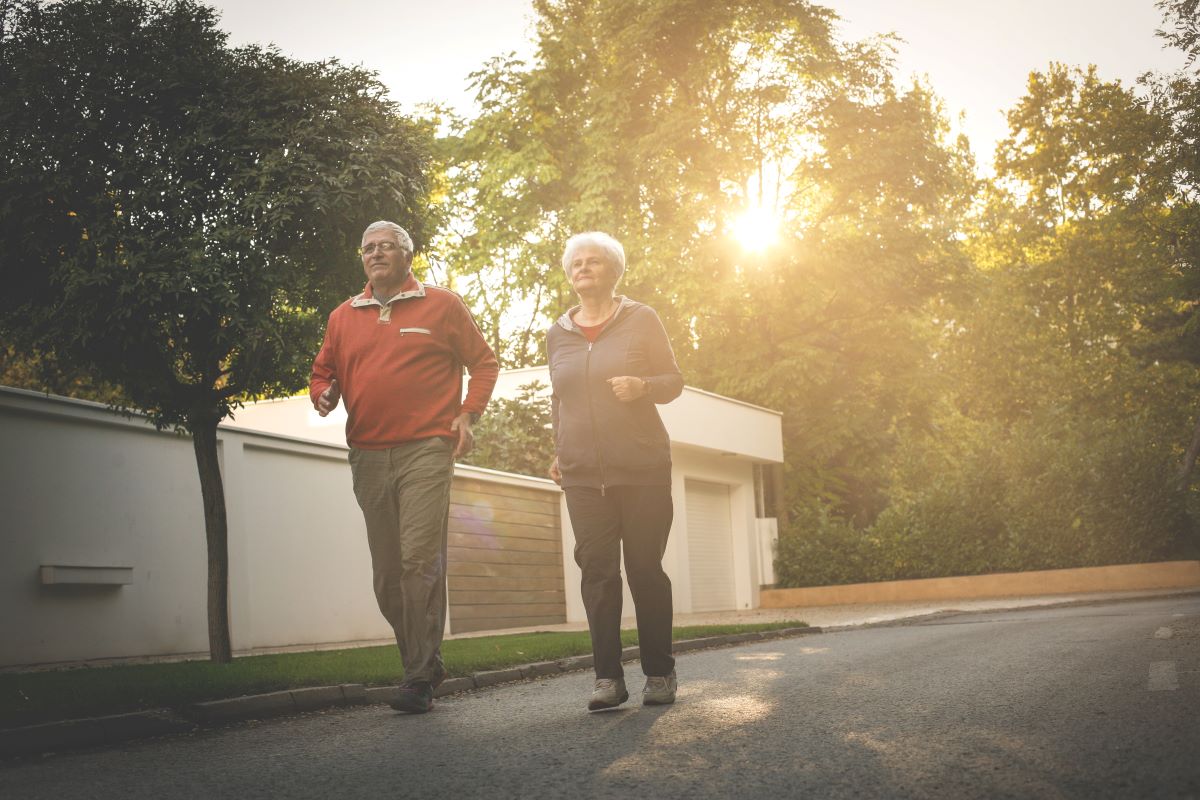 senior citizen couple jogging