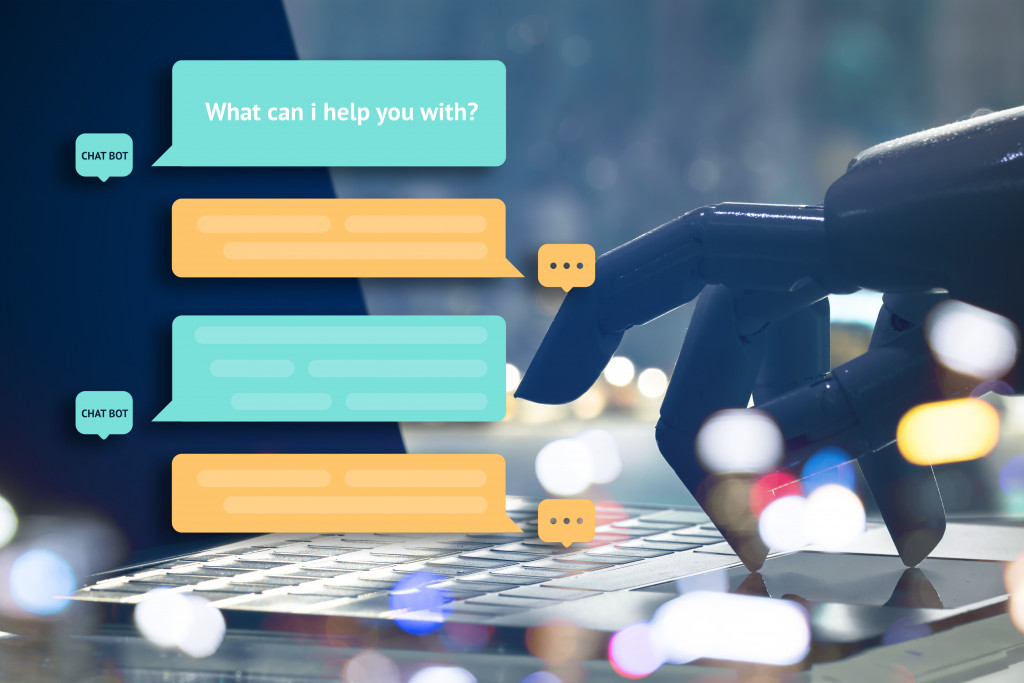 Chat bot and future marketing concept. Robot finger point to laptop button with automatic message popup