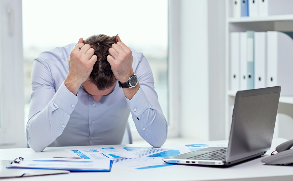 entrepreneur feeling stressed with work